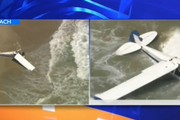 南加州飛機墜毀在海灘上！泳客抱著衝浪板飛奔救人